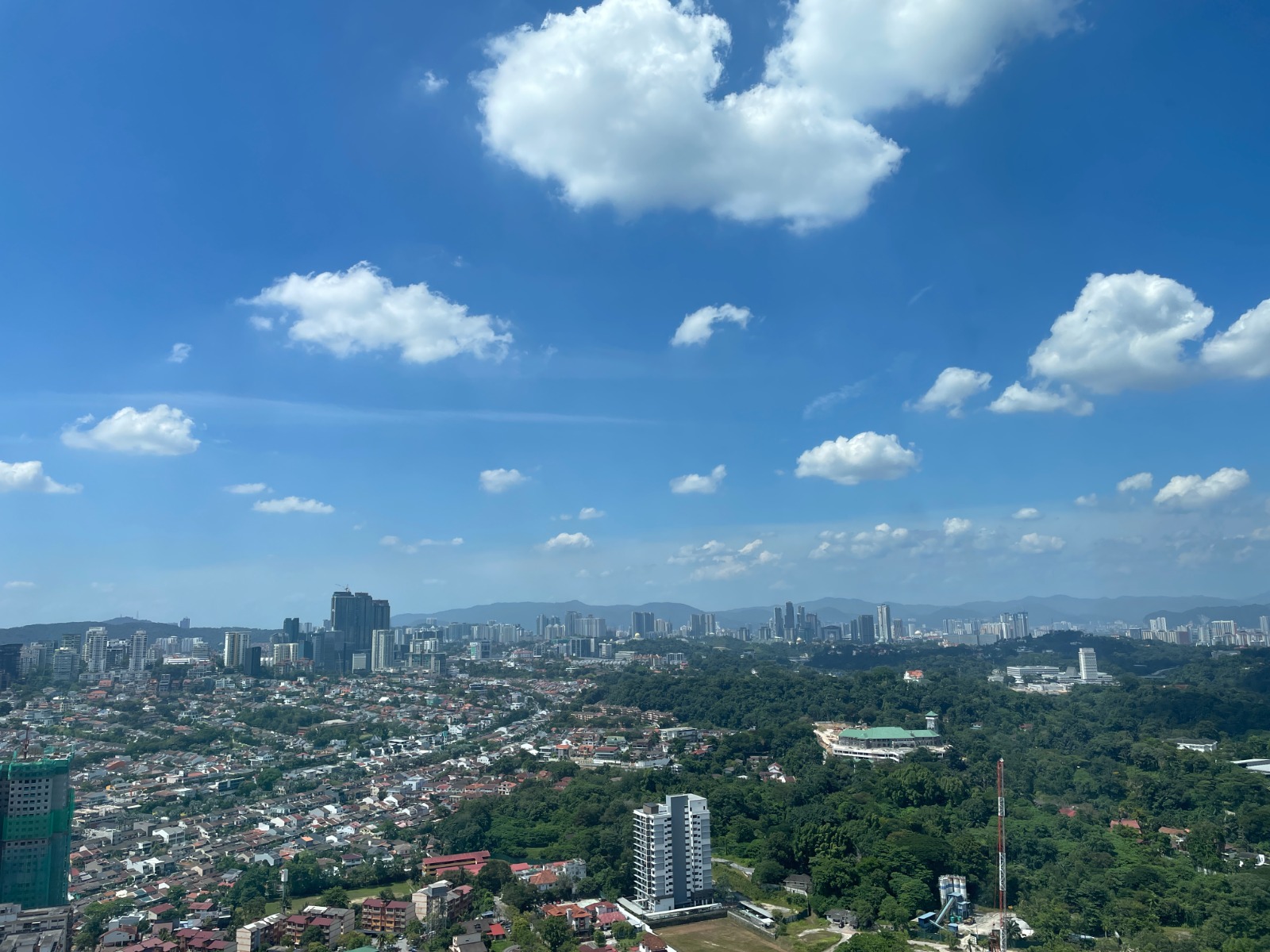 City panorama with residential neighbourhoods and greenery